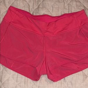lululemon bright pink running shorts